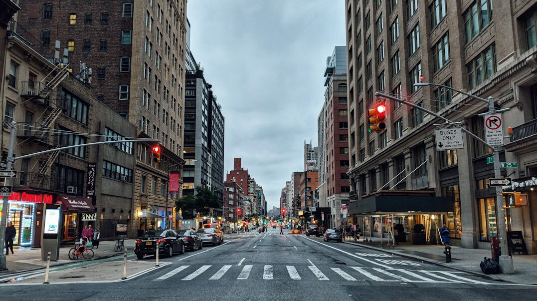 City street with traffic and buildings
