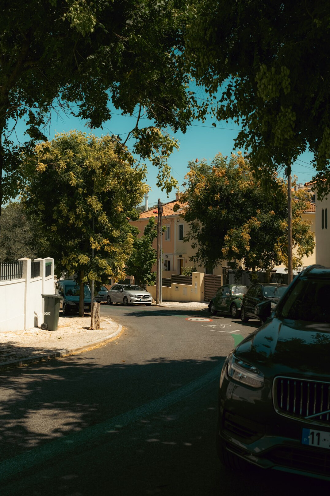 Car parked on a quiet road in daylight